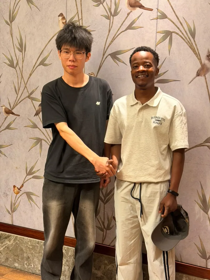 Two colleagues meeting at a supplier facility